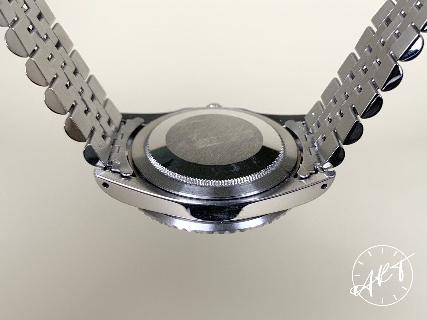 1980s Rolex GMT-Master Fuchsia Bezel Black Dial SS Auto Pilot Watch 16750