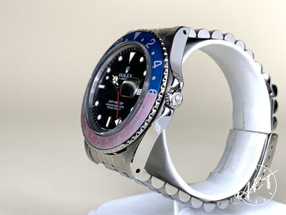 1980s Rolex GMT-Master Fuchsia Bezel Black Dial SS Auto Pilot Watch 16750