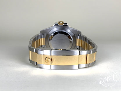 2013 Rolex GMT-Master II Gold Bezel Black Dial 18K Gold & SS Watch 116713LN BP